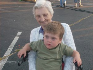 Michael wouldn't ride any of the carnival rides but loved riding with Grandma in her special chair.